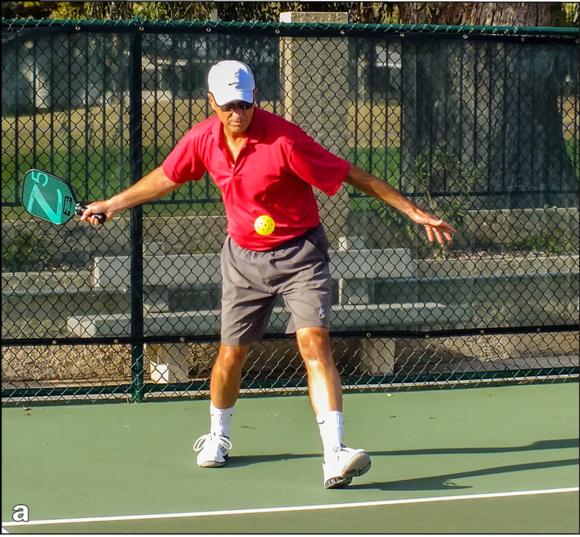 Figure 4.3 The forehand drive serve: () preparation, () contact, and () follow-through.
